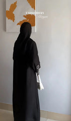 Elegant Black Abaya with White Floral Embroidery Sleeves – Premium Modest Wear