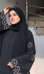 Elegant Black Abaya with White Floral Embroidery Sleeves – Premium Modest Wear