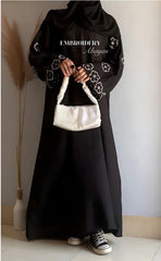 Elegant Black Abaya with White Floral Embroidery Sleeves – Premium Modest Wear